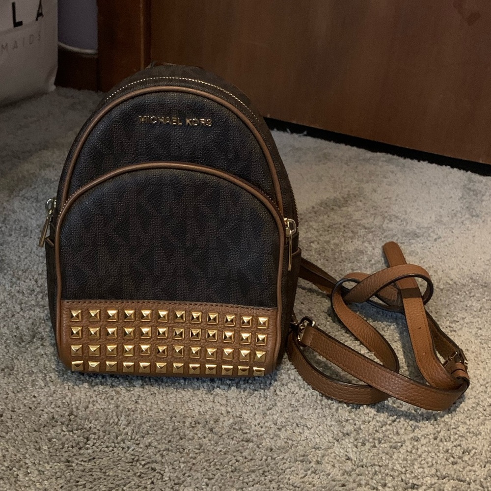 MK Abbey studded mini pack pack